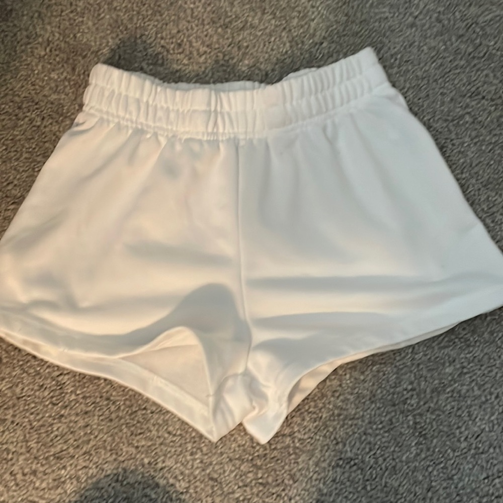 This is a white high waisted pair of shorts